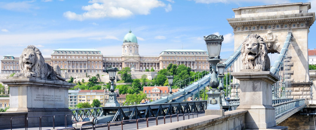 View of the Chain Bridge with its four lions and the Royal Palace of Budapest.