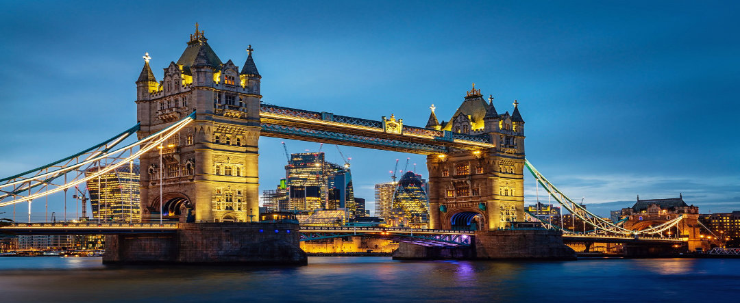 Tower Bridge crossing over the River Thames in London.