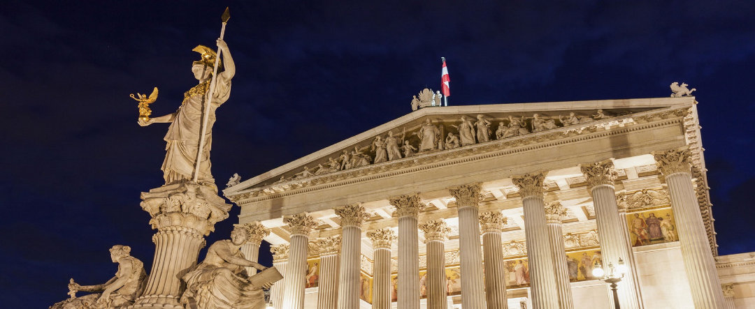 Austrian Parliament Building with the statue of the Greek goddess of wisdom in Vienna.